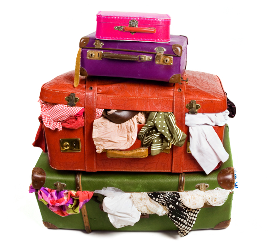 overstuffed suitcases